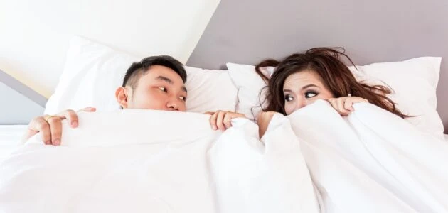 Couple in bed, sleep and weight loss, lack of sleep | Shawn Phillips Personal Trainer & Nutritionist Los Angeles