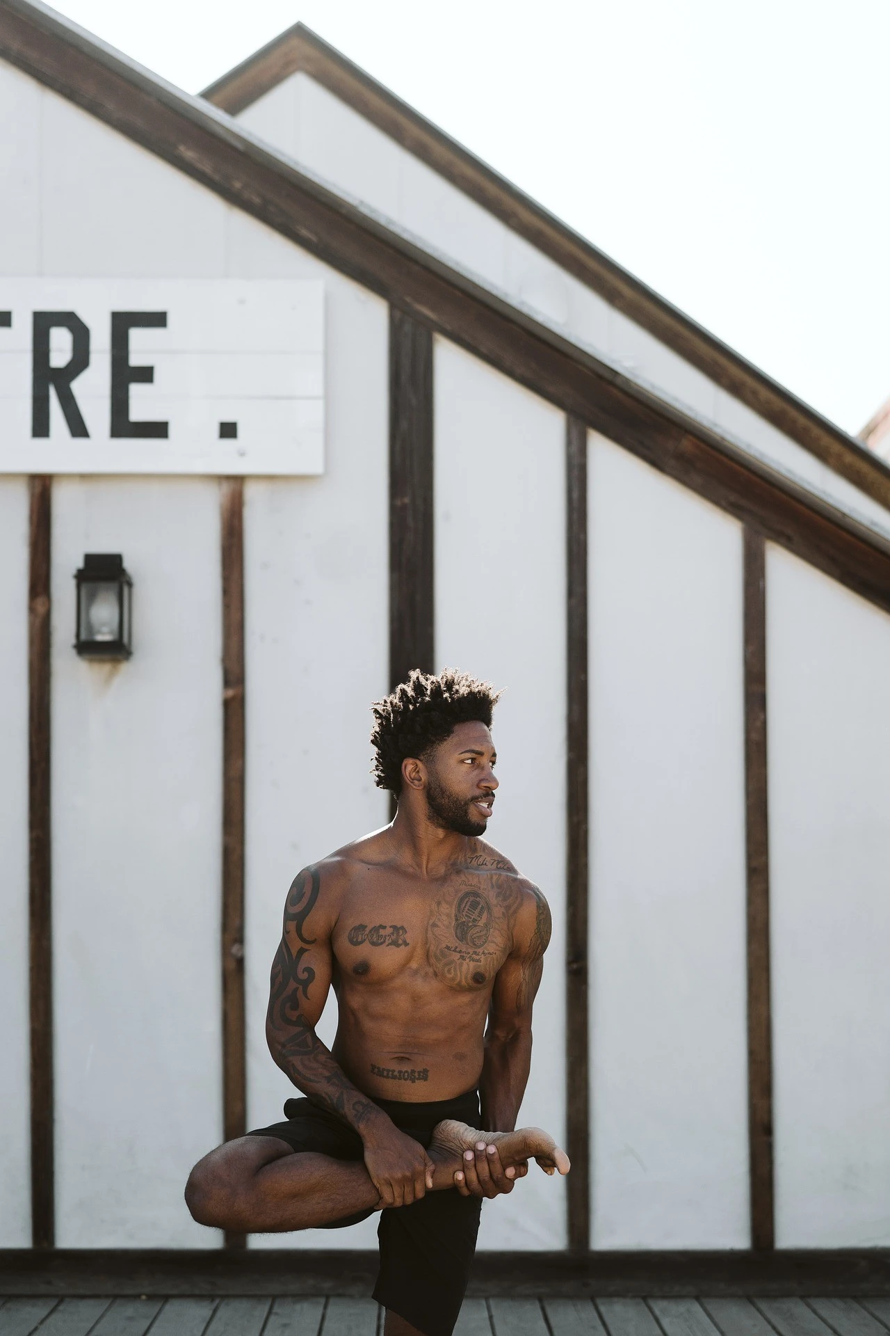 Man stretching, drinking water to lose weight, water and weight loss | Shawn Phillips Personal Trainer Los Angeles